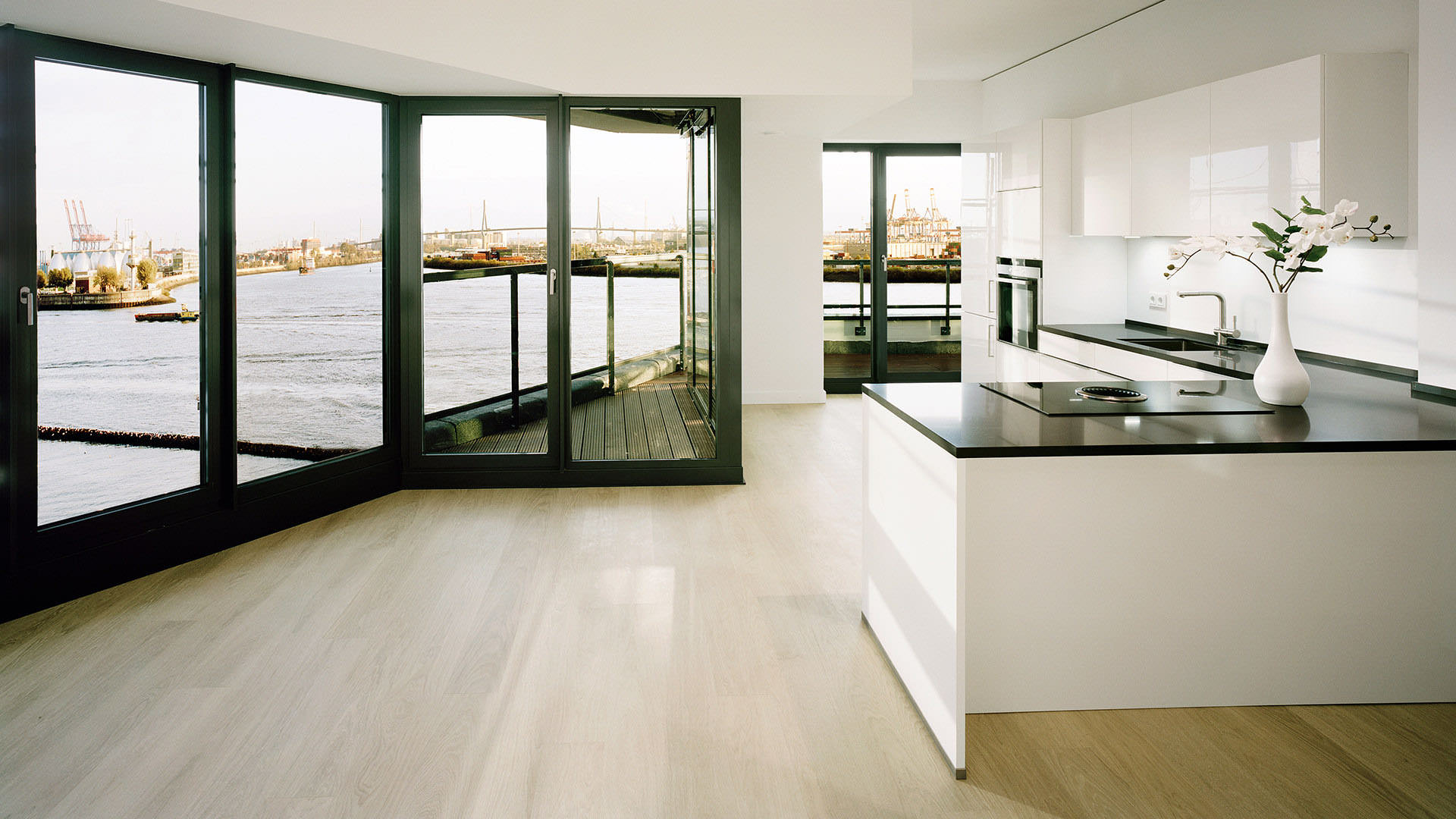 View out over the water, parquet underfoot